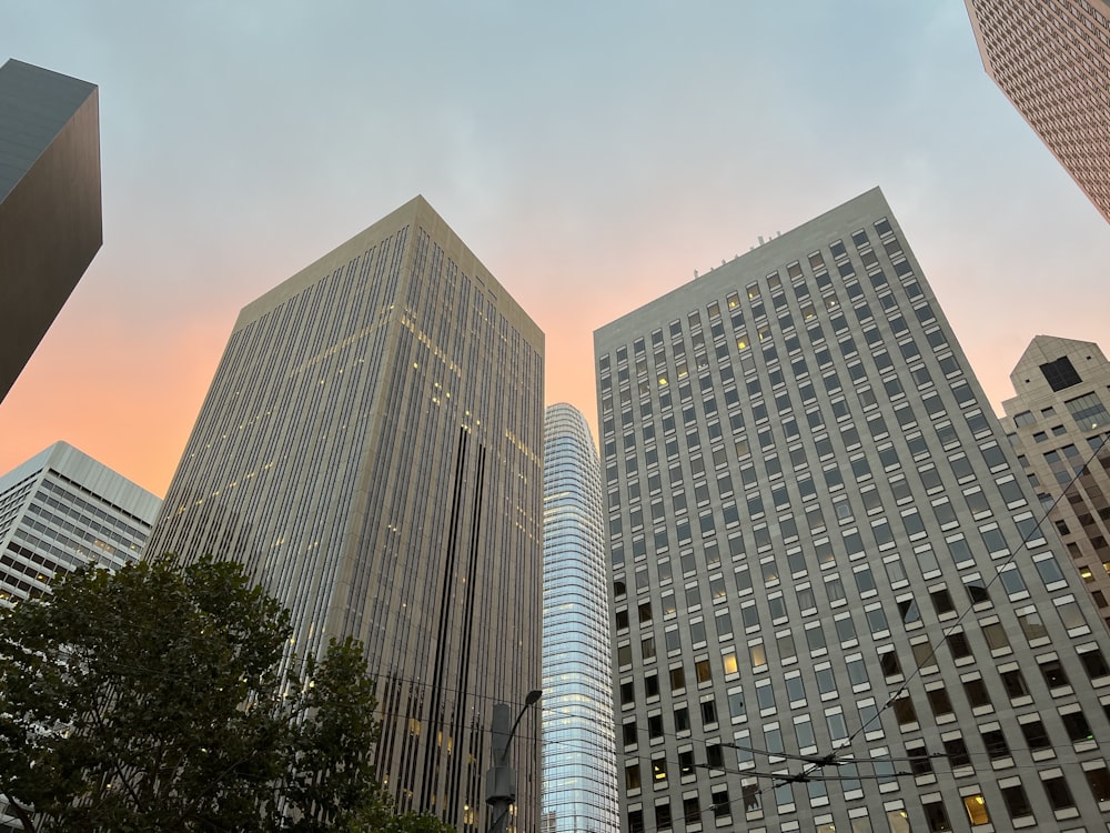 a group of tall buildings sitting next to each other