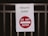 A sign is attached to a metal railing. The sign reads 'PRIVATE EVENT' in green text and features a red circle with a white horizontal bar accompanied by the words 'DO NOT ENTER' in white.