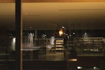 Blurred background of a classic law library with warm wooden shelves and soft bokeh lights.