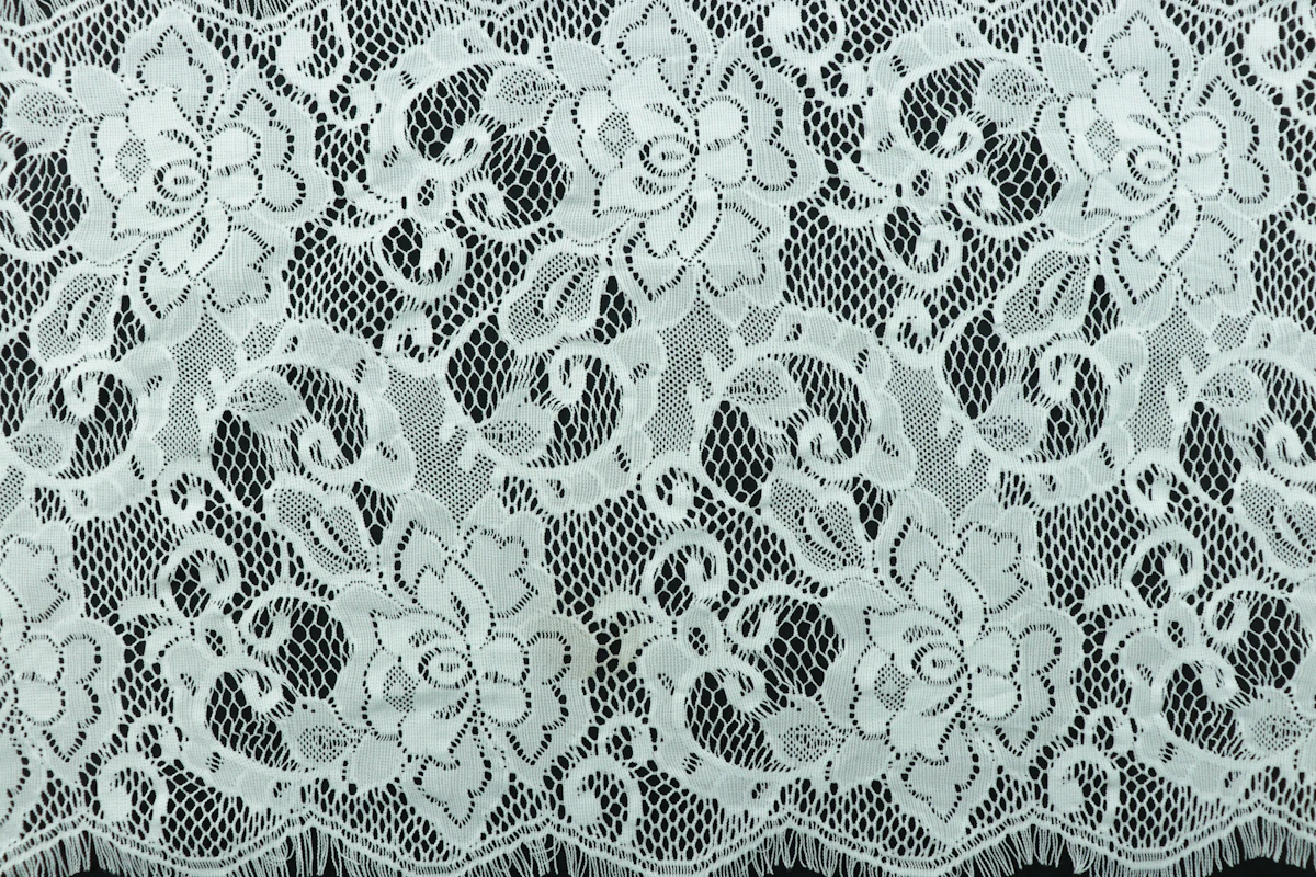 White lace on a black background