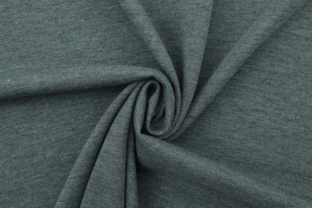 a close up shot of a grey fabric