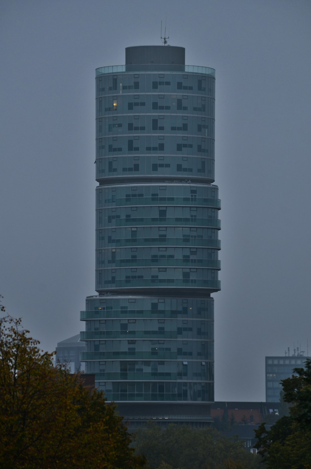 a tall building with a clock on the top of it