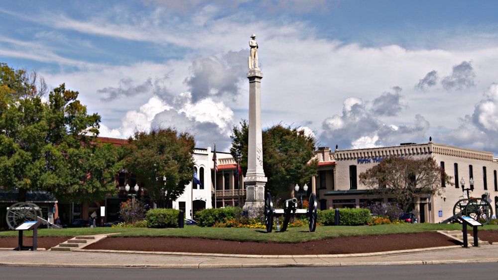 a clock tower in the middle of a town