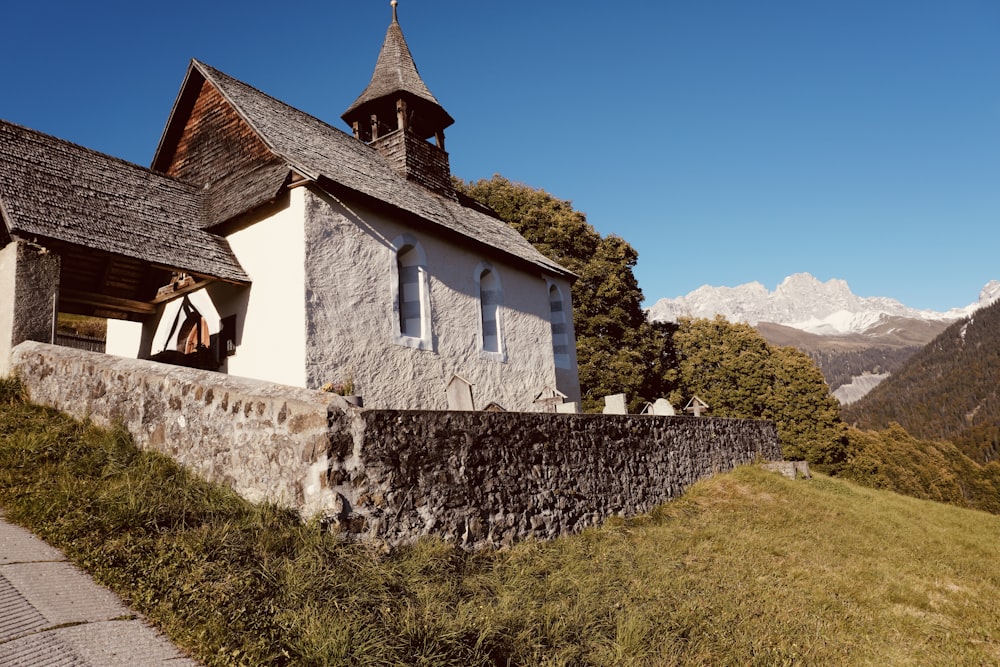 an old church with a steeple and a bell tower