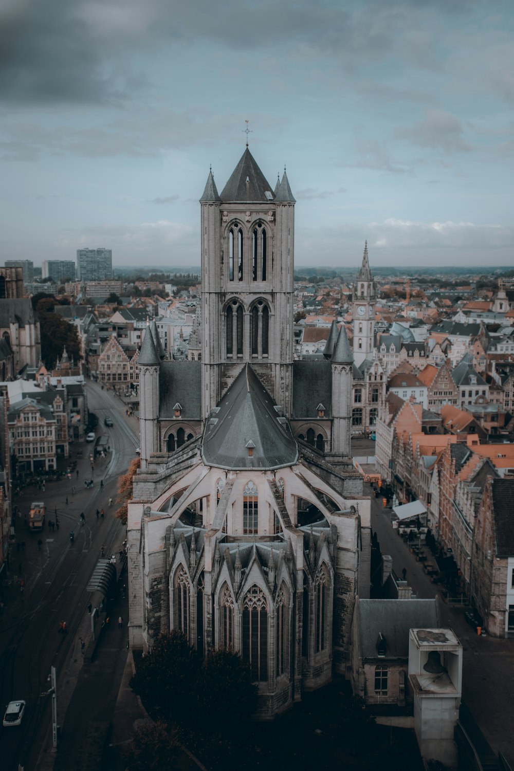 an aerial view of a cathedral in a city