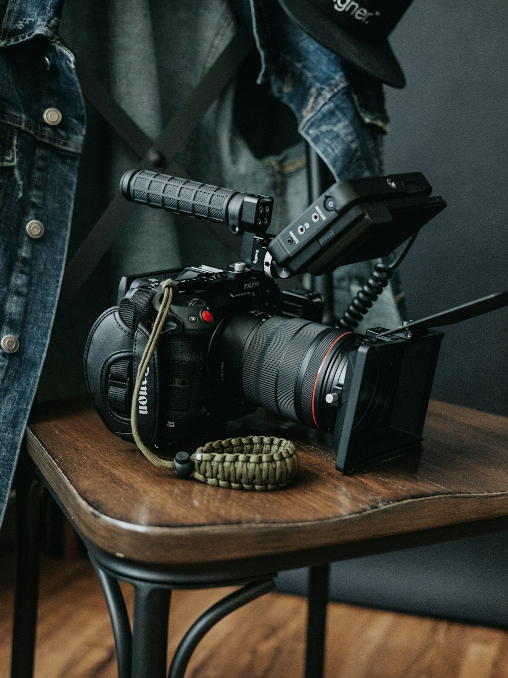 a camera sitting on top of a wooden table