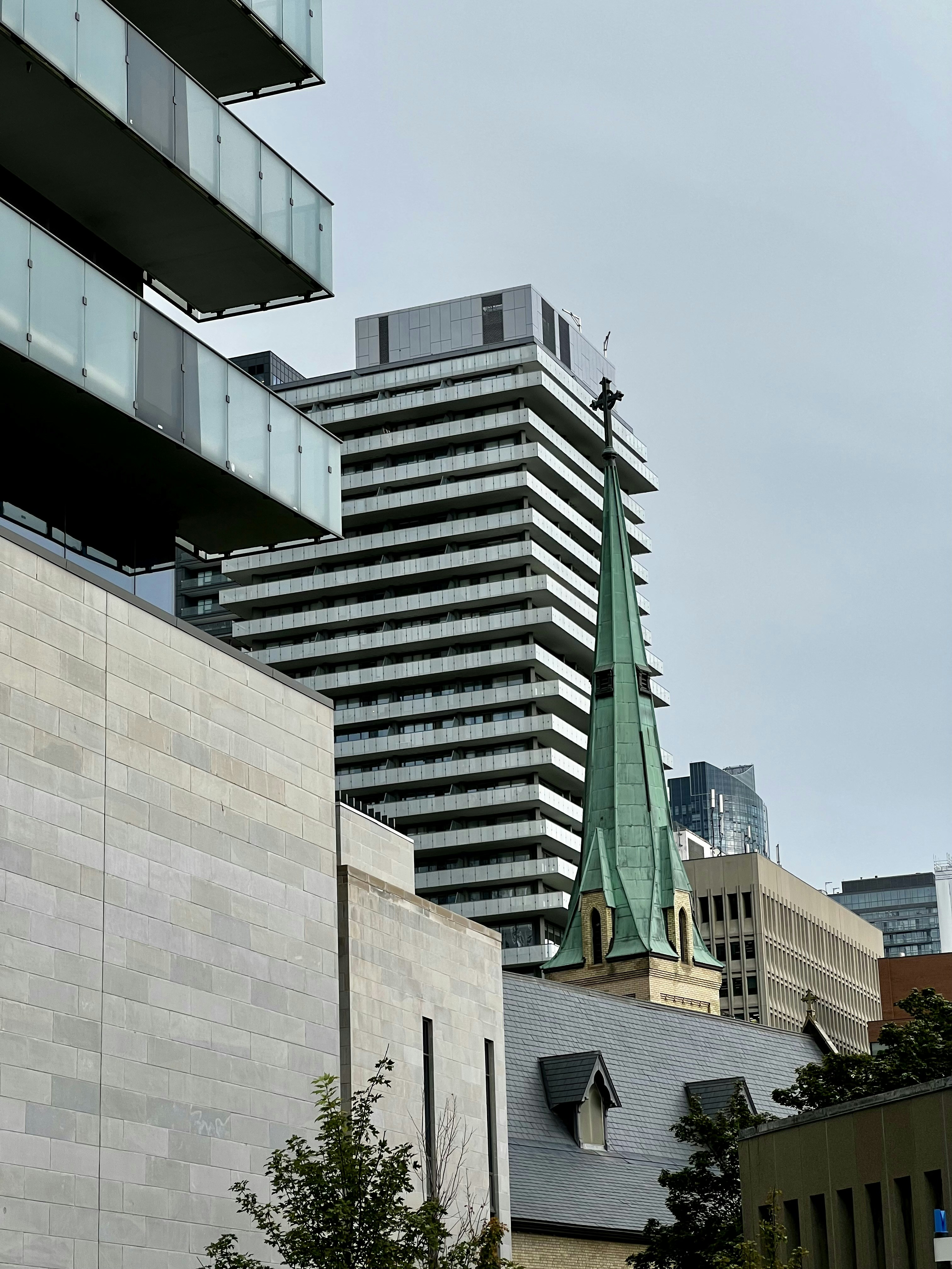 a building with a steeple and a clock on it