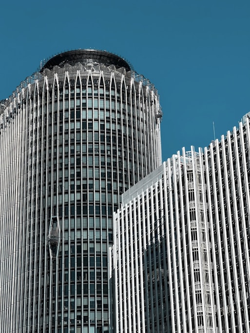 a very tall building with a clock on it's side