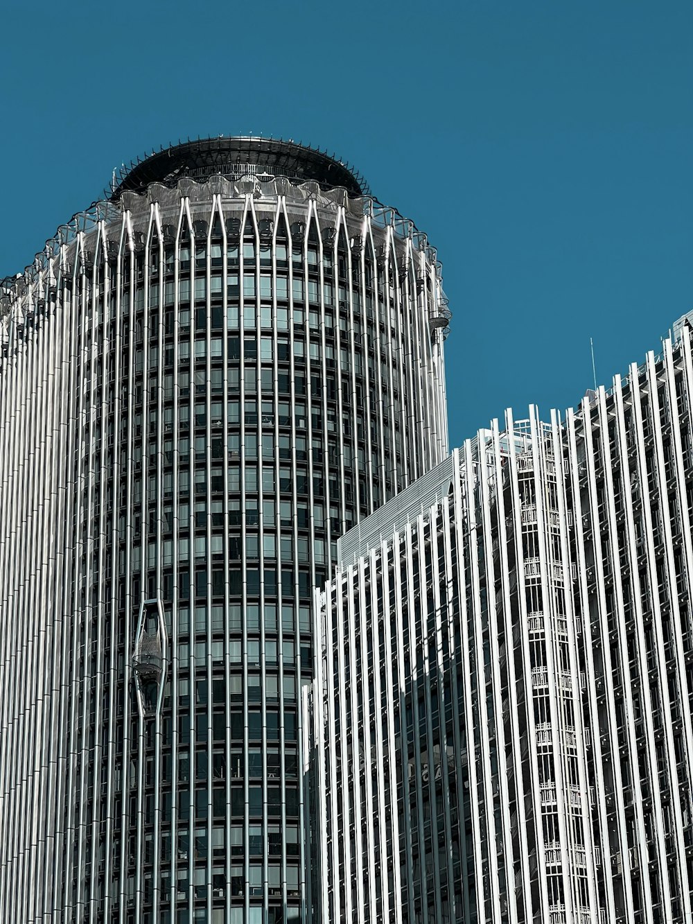 a very tall building with a clock on it's side