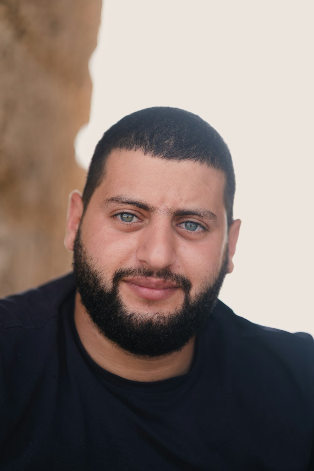 a close up of a person with a beard