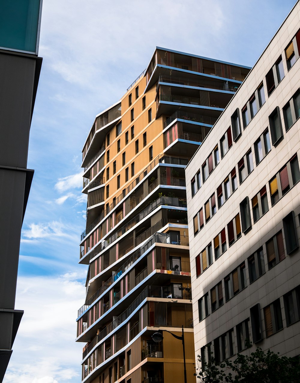 a tall building sitting next to a tall building