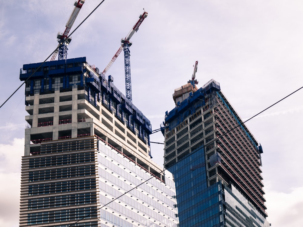 a couple of tall buildings under construction