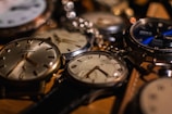 a bunch of watches that are sitting on a table
