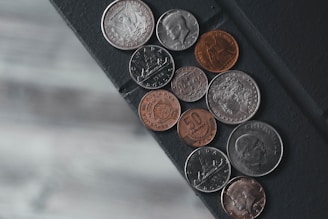 a bunch of coins sitting on top of a table