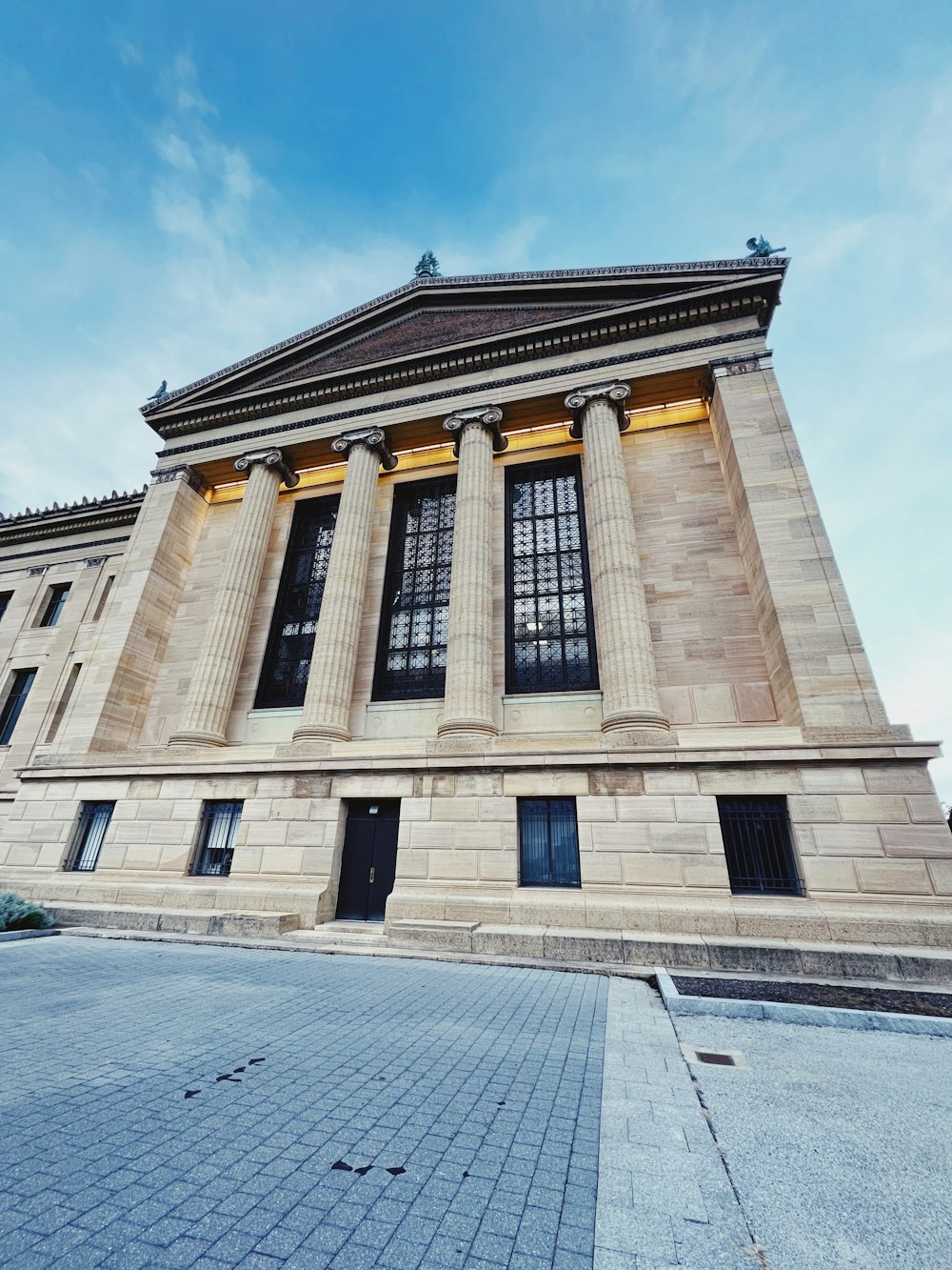 a large building with a lot of windows on the side of it