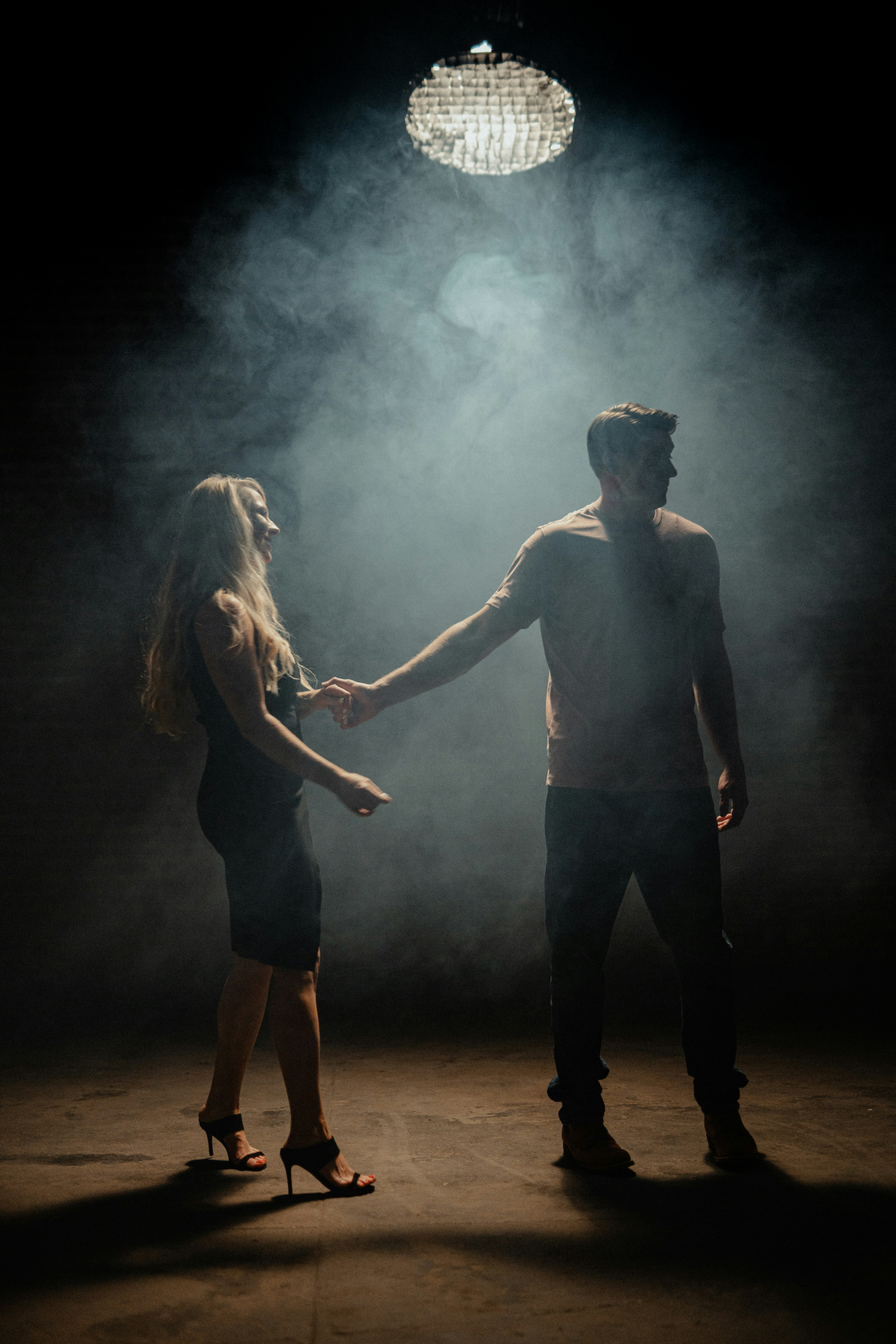 Couple dancing together at night