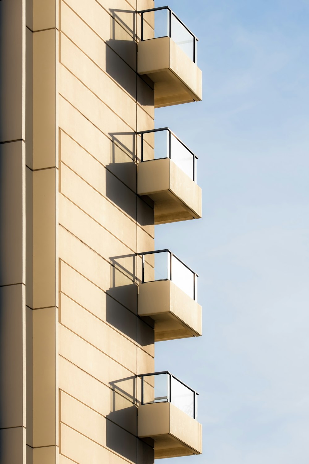 a tall building with balconies and balconies on the balconies