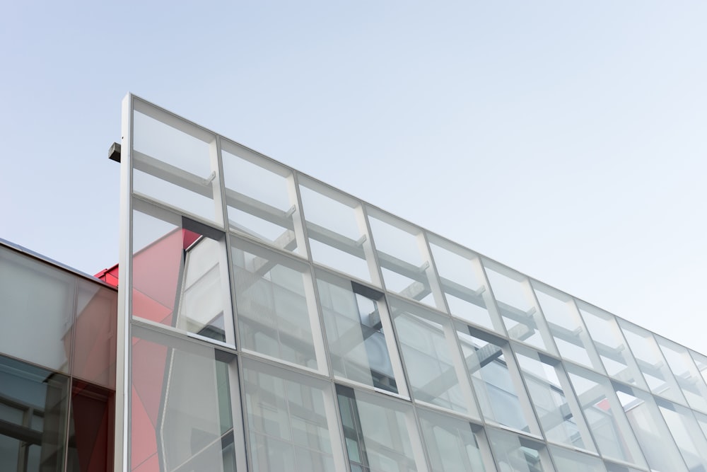 a building with a lot of windows and a sky background