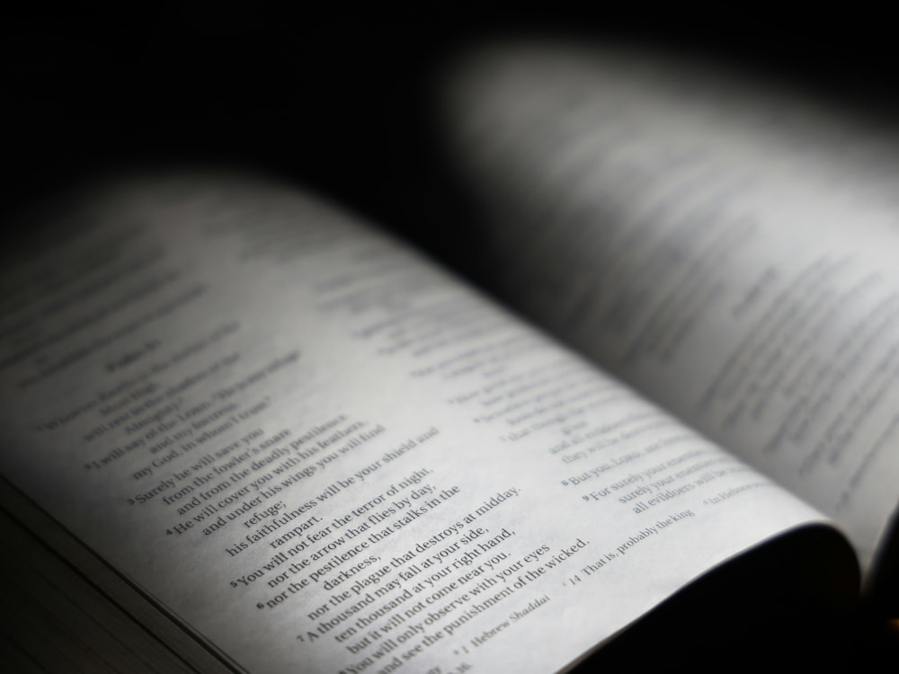 an open book sitting on top of a table