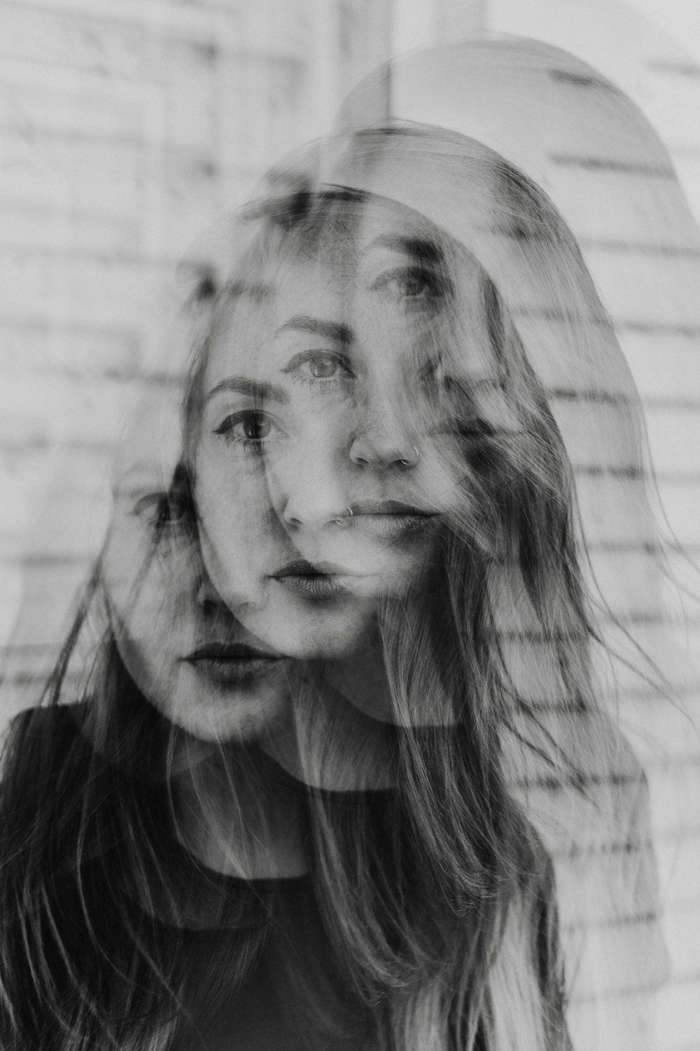 a black and white photo of a woman's face