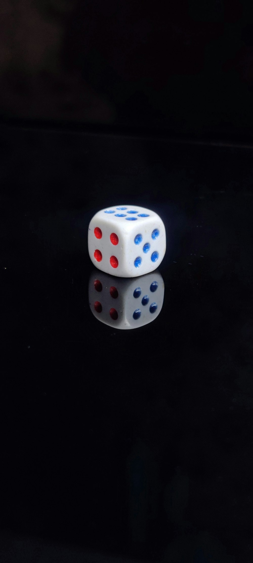 a pair of dice sitting on top of a table
