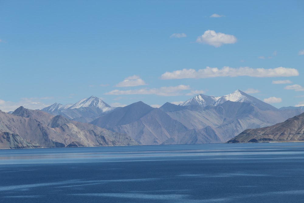 a large body of water surrounded by mountains