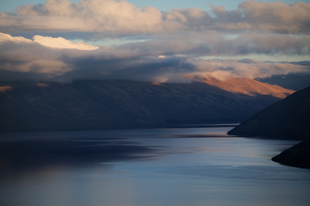 a large body of water surrounded by mountains