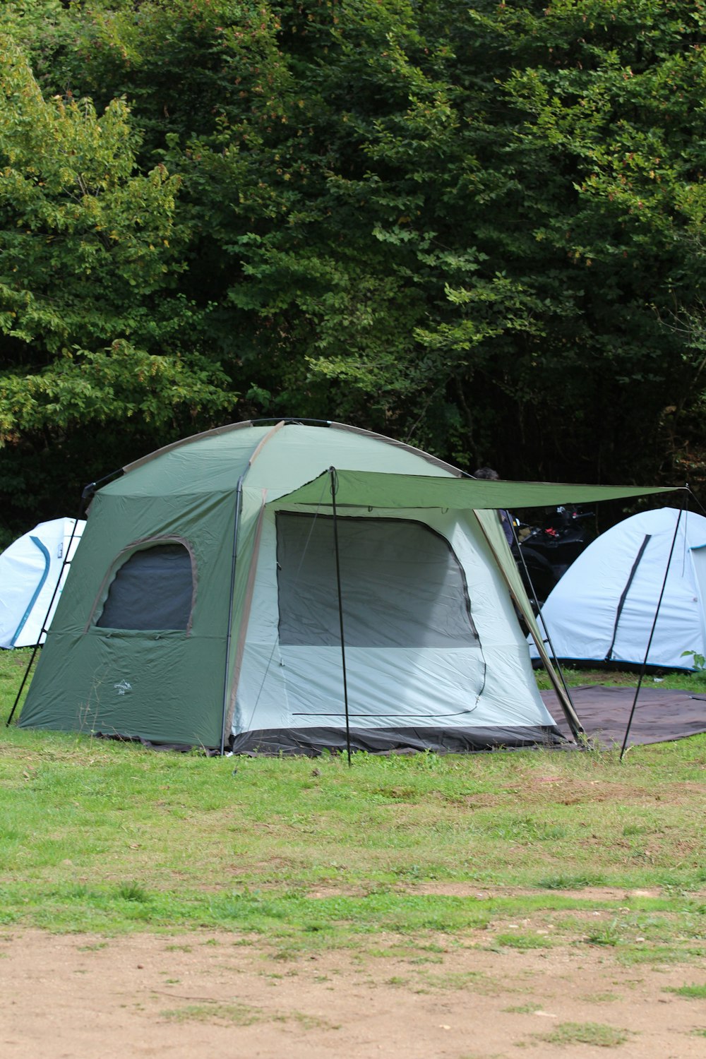 a group of tents set up in a field