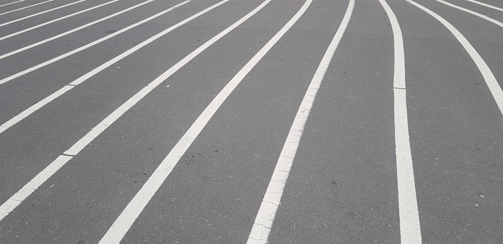 a parking lot with lines painted on it