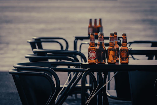a group of beer bottles sitting on top of a table