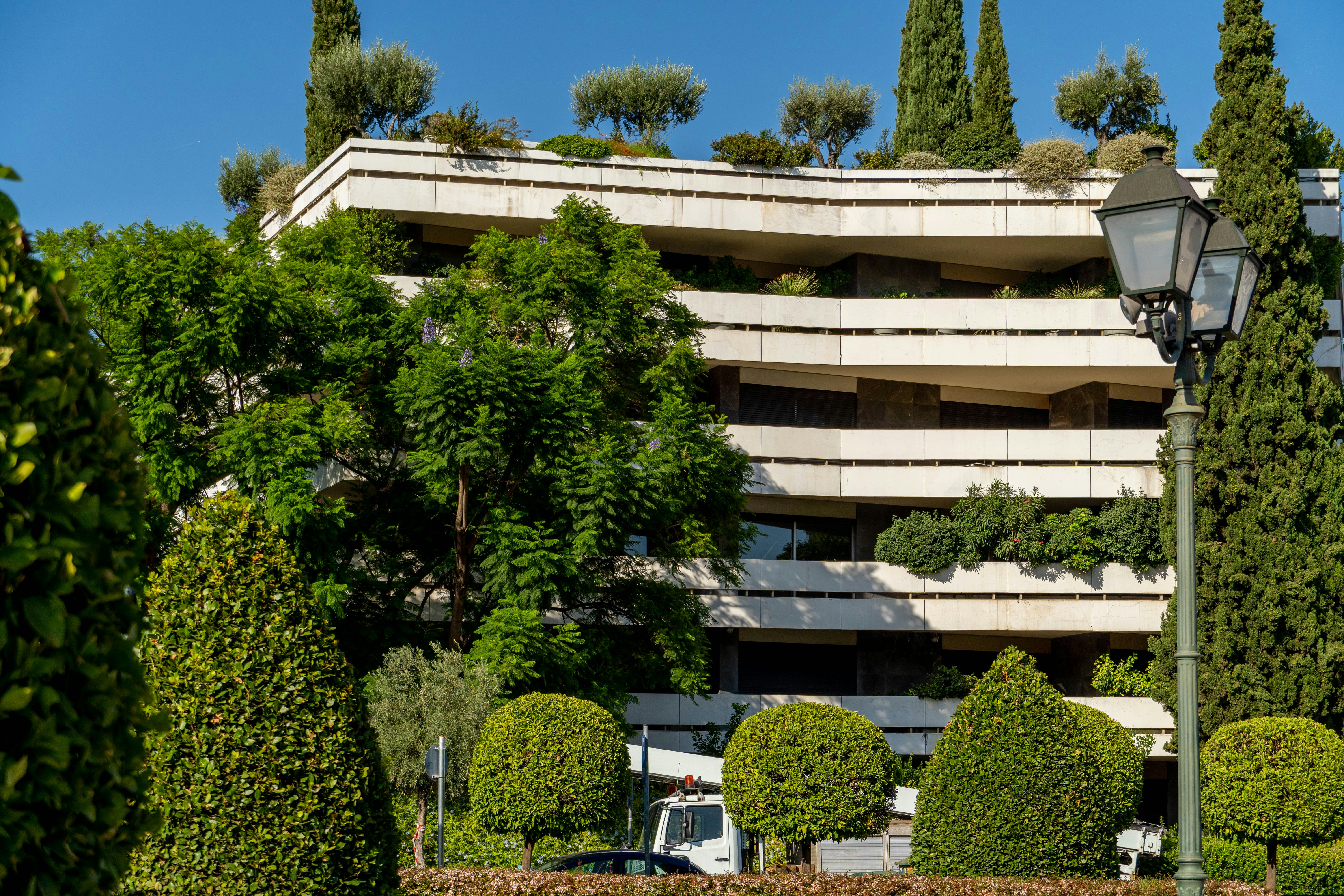 a building with a lot of trees around it