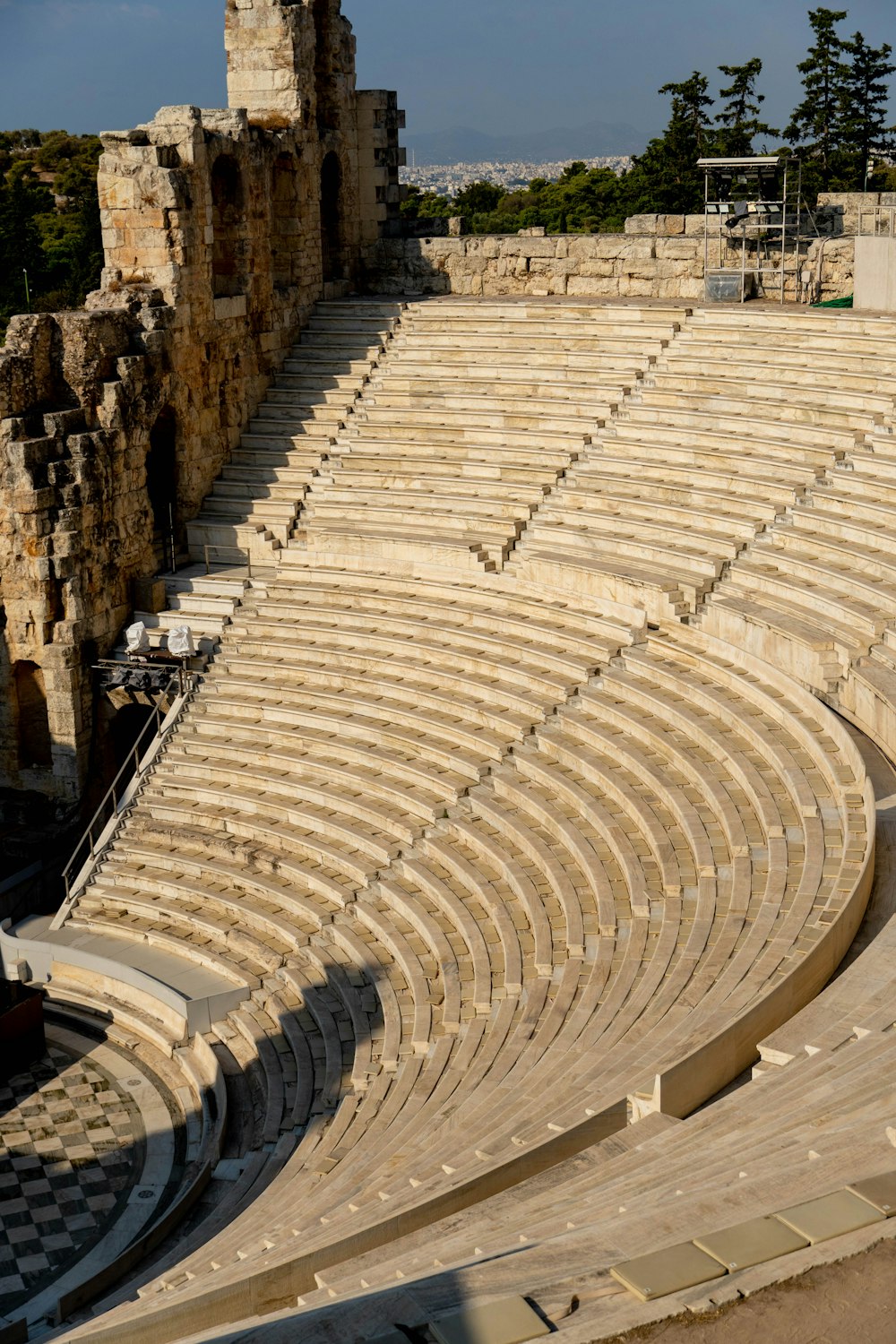 a large stone amphit with a row of seats