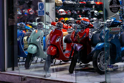 a group of motor scooters parked next to each other