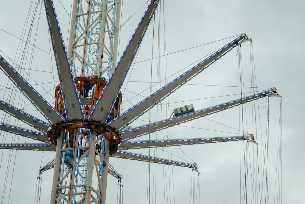 a ferris wheel with a sky background