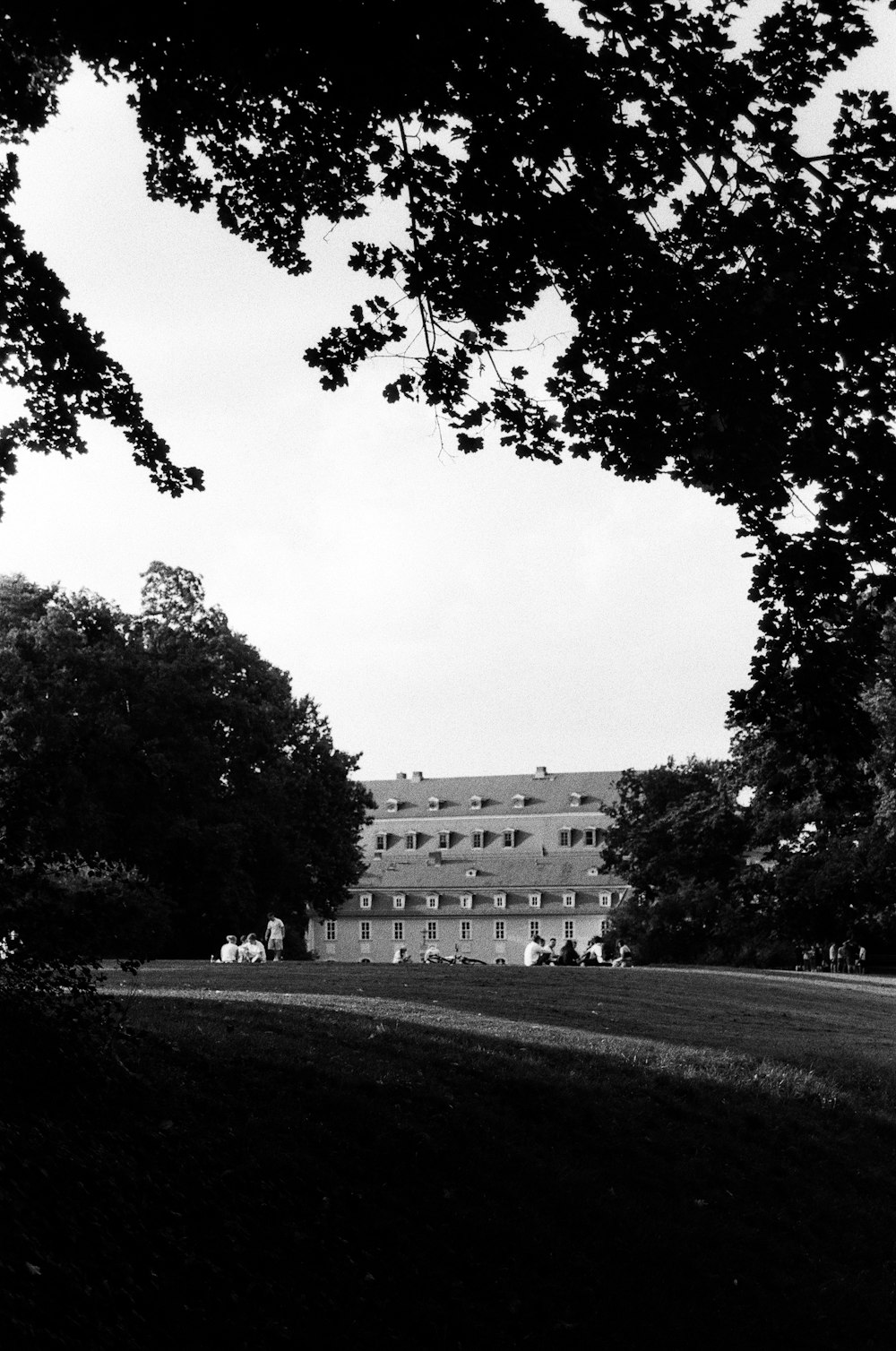 a black and white photo of a large building