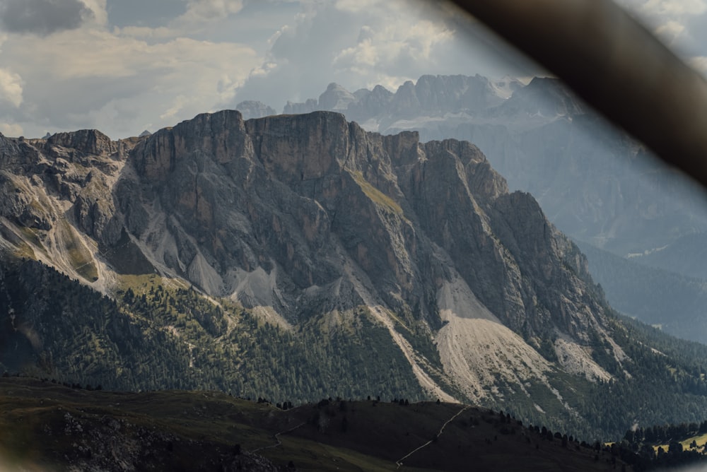 a view of a mountain range through a window