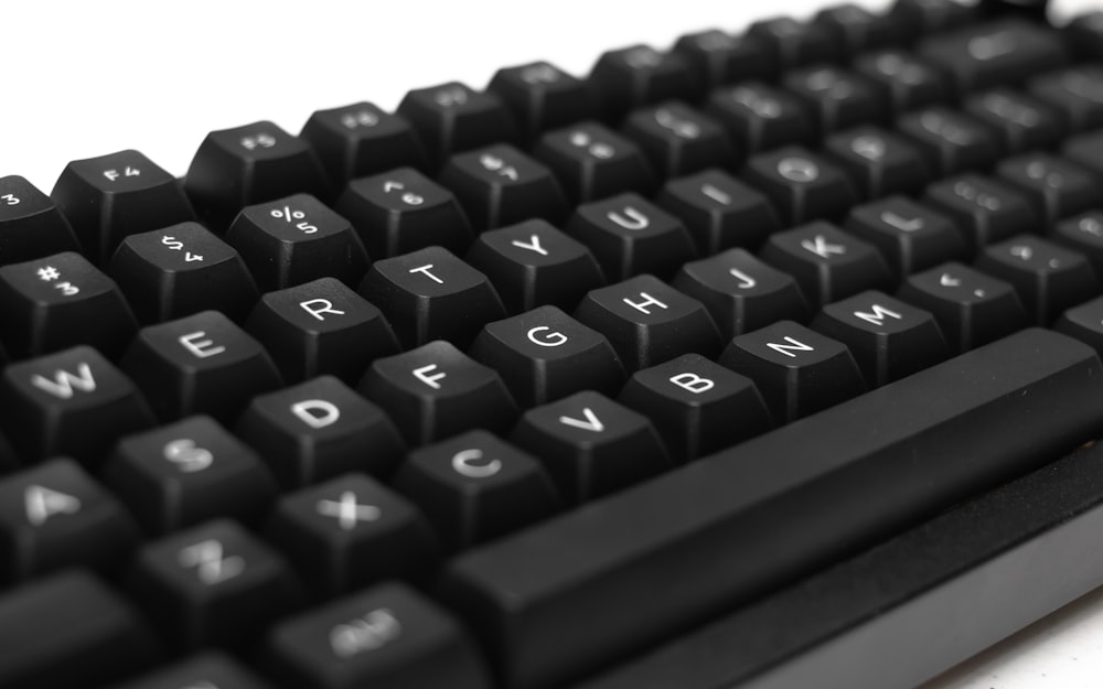 a close up of a black computer keyboard