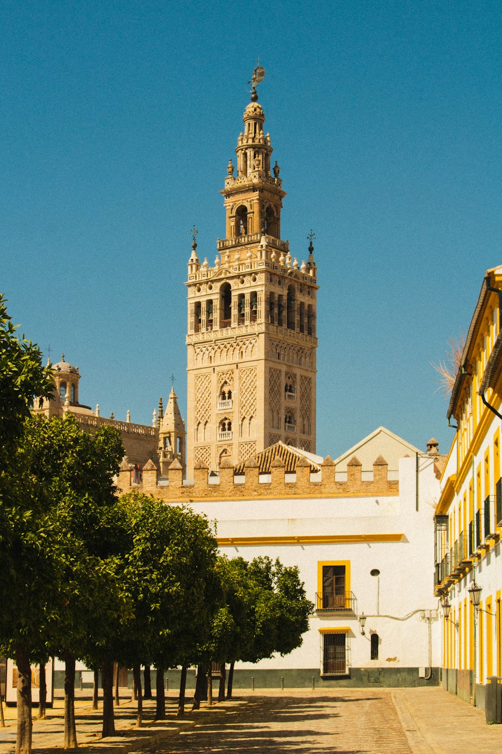 a tall clock tower towering over a city