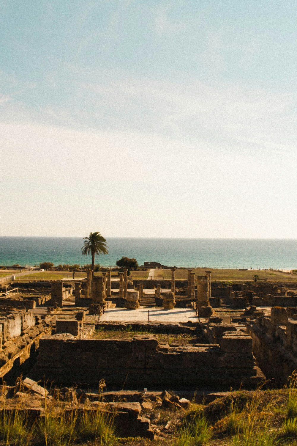 the ruins of a city near the ocean