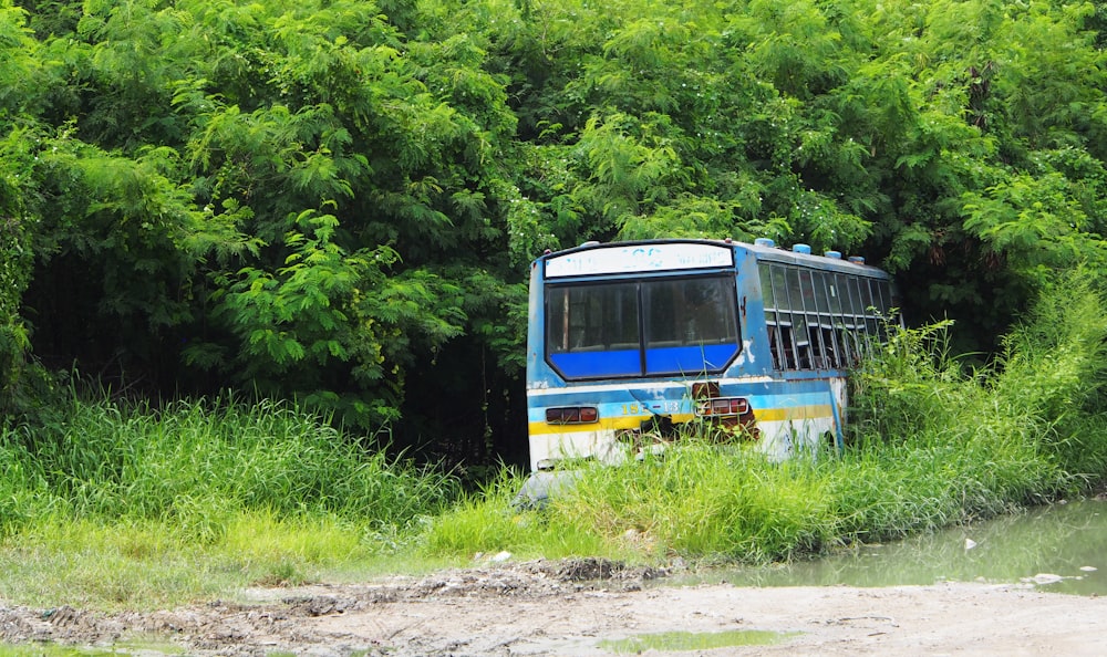 a bus that is sitting in the grass