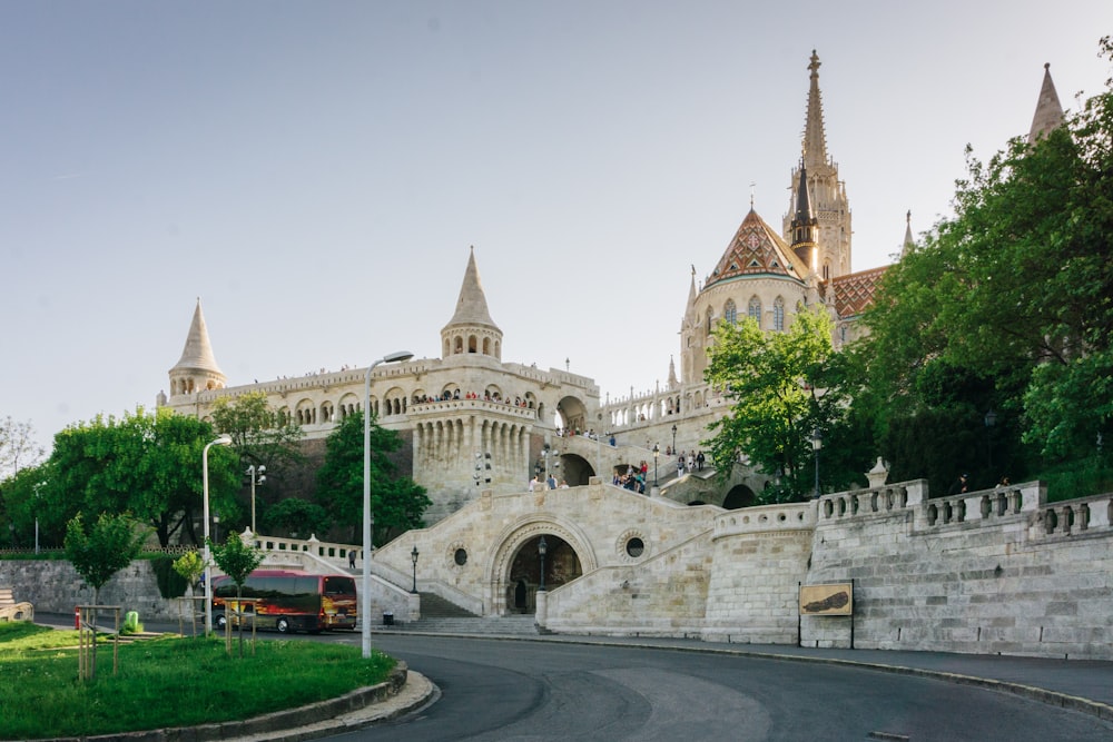 a large castle like building with a steeple on top of it