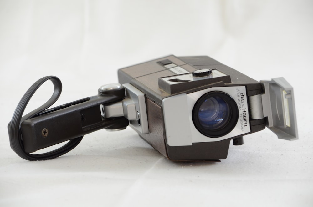 a camera with a flash drive attached to it