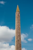a tall obelisk with egyptian writing on it