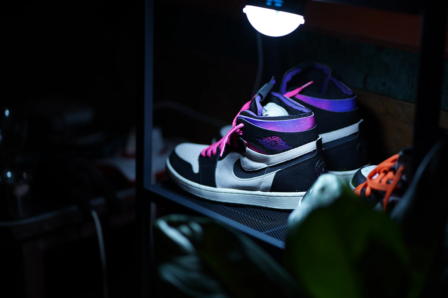 Air Jordan high-tops displayed under focused light