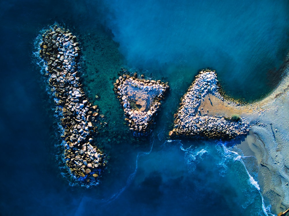 a bird's eye view of a rocky beach