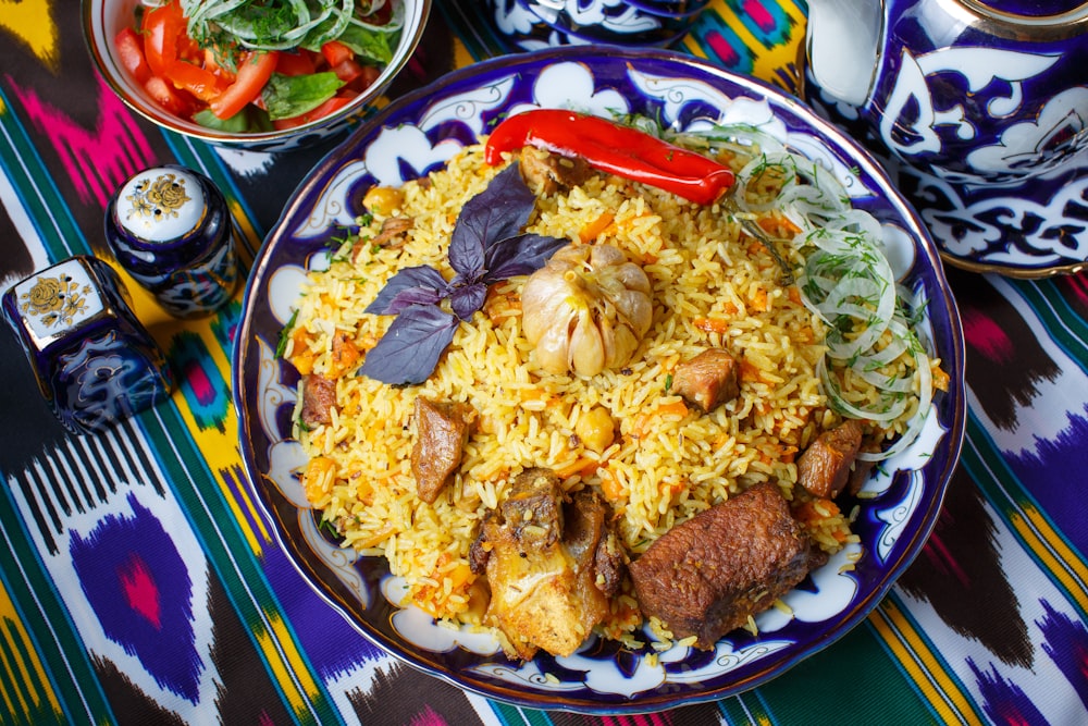 a plate of food on a colorful table cloth