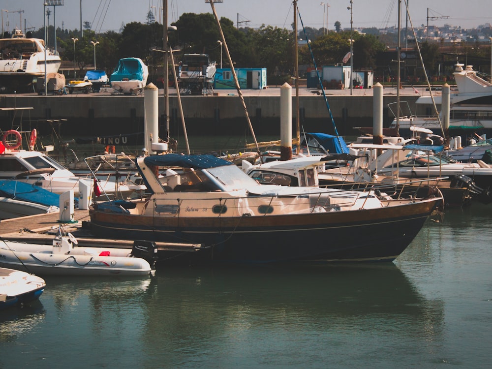 a group of boats docked at a marina