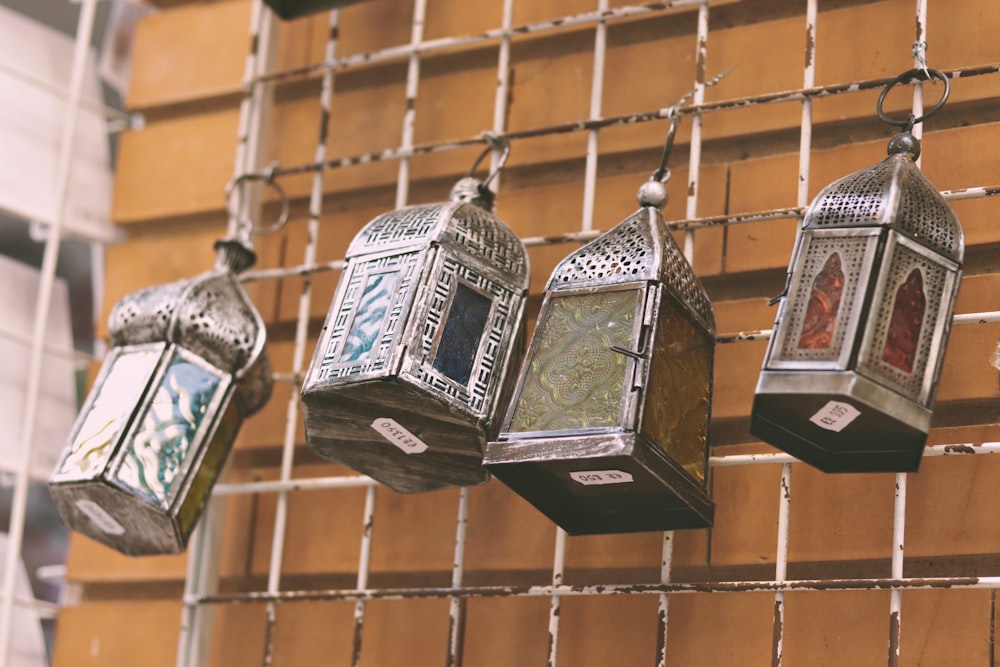 a group of lanterns hanging from a wall