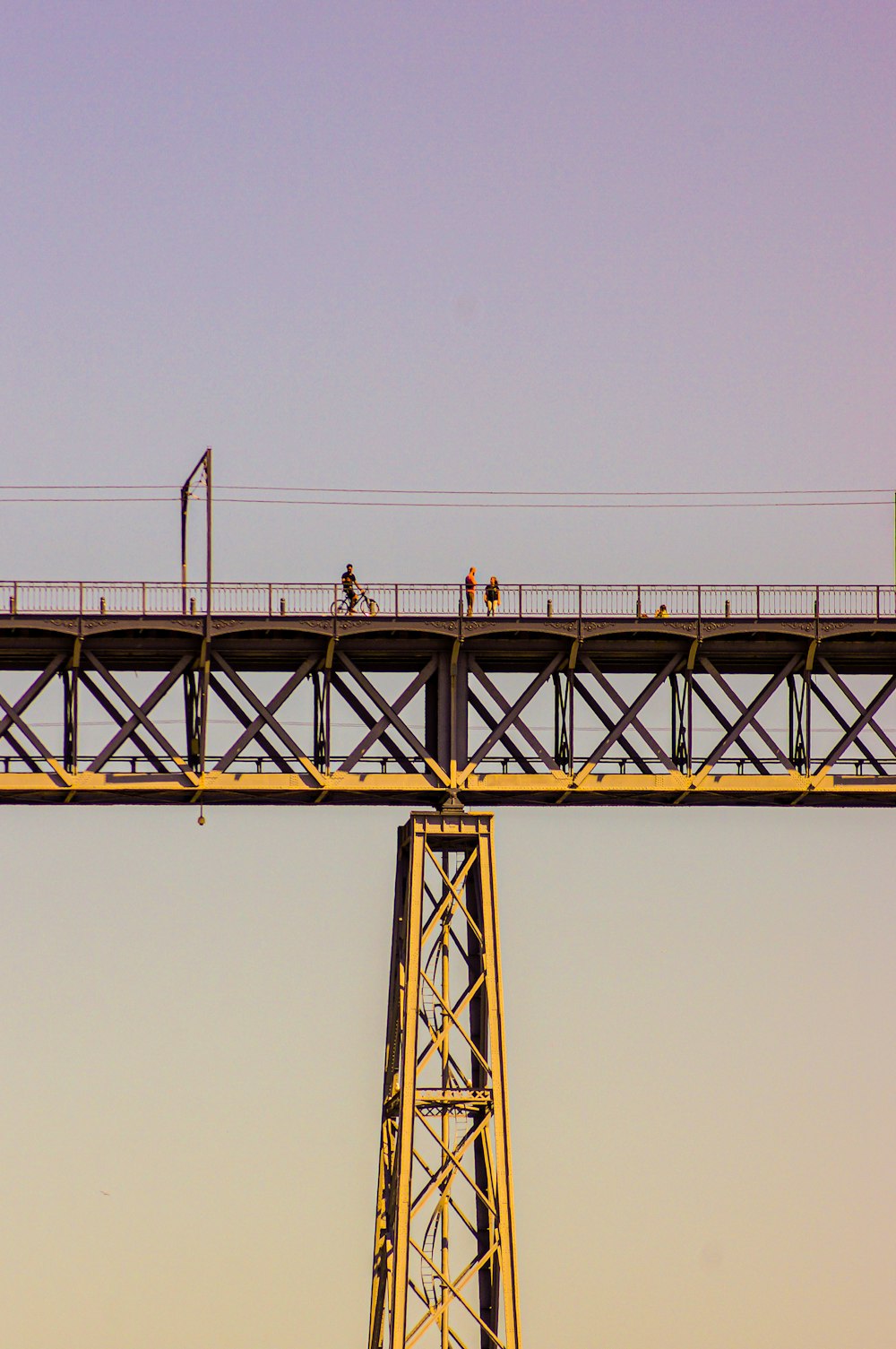 a tall bridge with a train on top of it