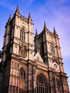 a large cathedral with a clock on the front of it